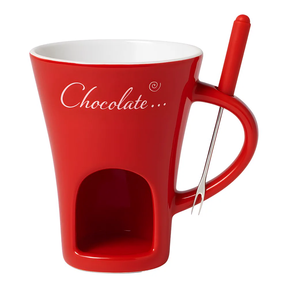 Red fondue mug with white interior, arch in the base and a red-handled fondue fork in the handle.